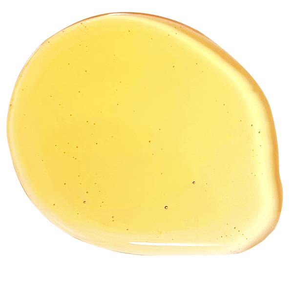 Cannabigerol (CBG) Crystal Resistant Disitillate is a high potency broad spectrum of cannabinoids including CBG, CBD, CBT, CBC and others. Image demonstrates its light golden amber translucent  coloring and flowability.