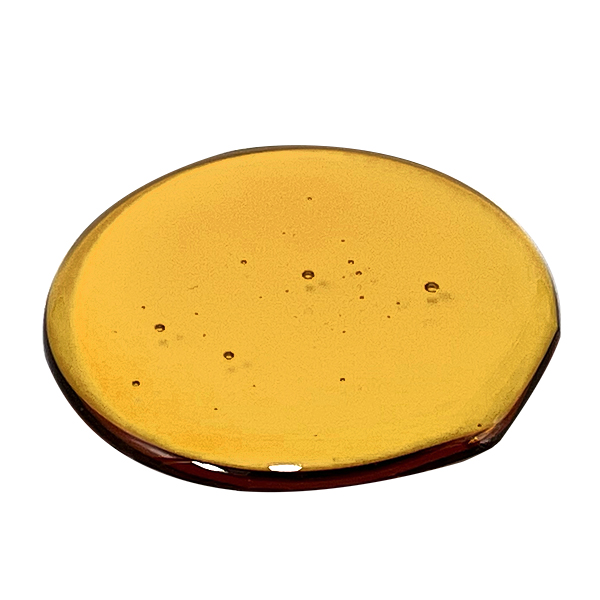 Full Spectrum Distillate Compliant retains all of the beneficial plant compounds with less than 0.3% THC, within the federal limit of THC. Image demonstrated the golden amber transluscent color of Compliant Full Spectrum Distillate