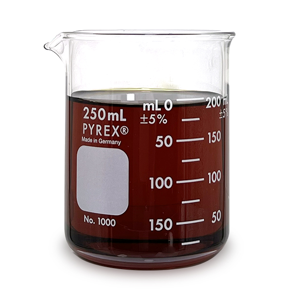 Full Spectrum Compliant Distillate is a full spectrum of cannabinoids found within the hemp plant including THC that is federally legal at ≤ 0.3%. Image demonstrates that Compliant CBD Full Spectrum Distillate can be heated to a liquid state and is a dark amber translucent color.